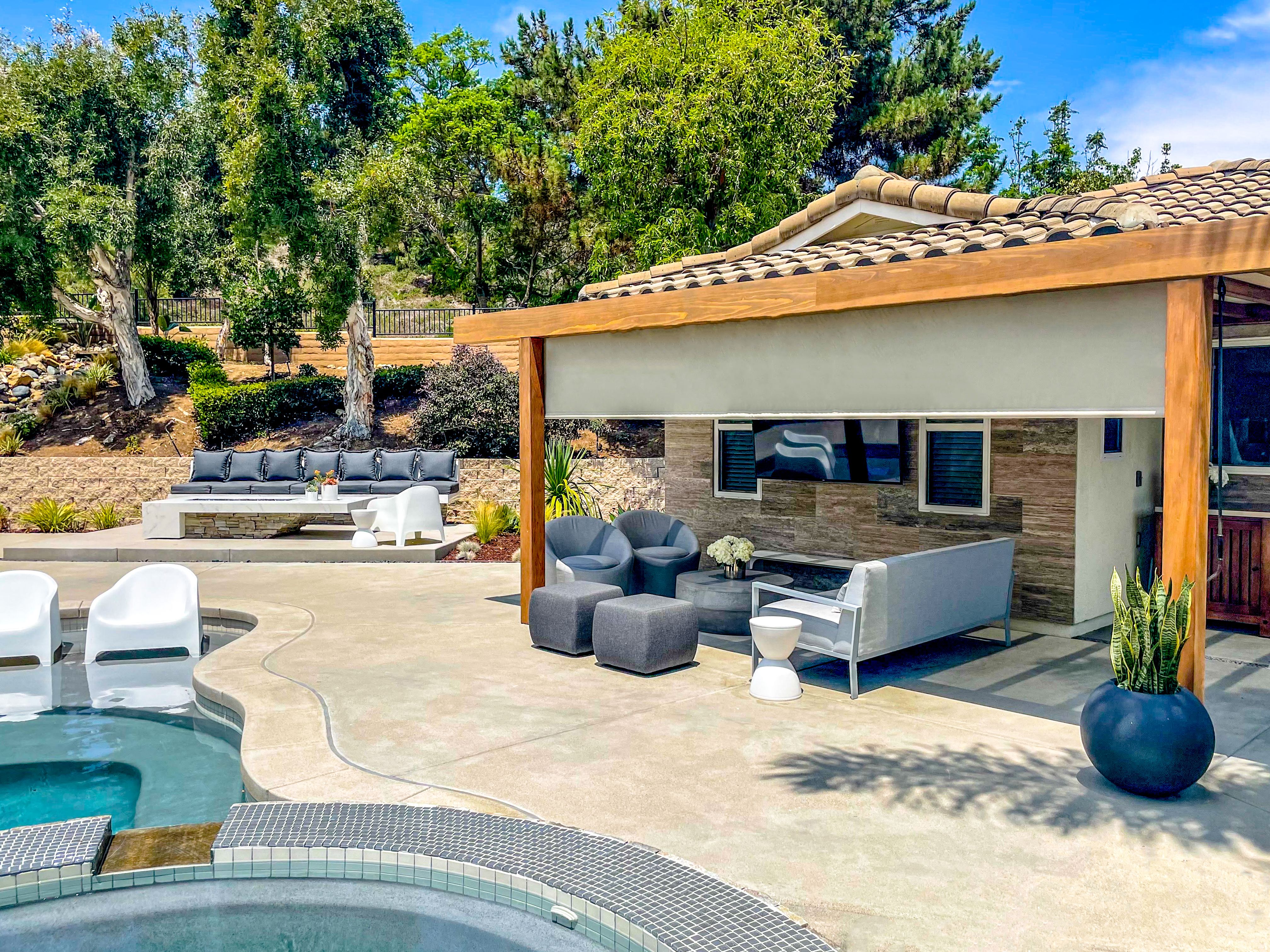 Retractable patio screens lowered across a lanai